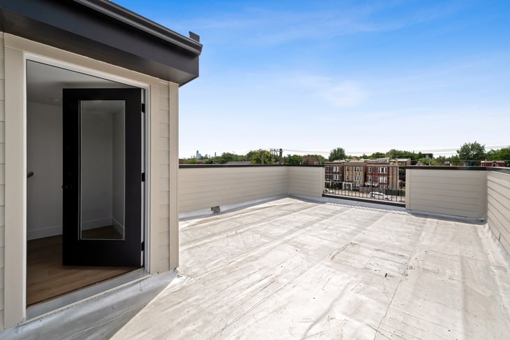 Rooftop deck at a Quality Builders single-family project in Logan Square